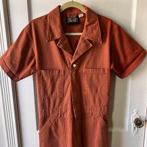 BIG BUD PRESS SHORT SLEEVE JUMPSUIT IN DISCONTINUED COLOR CLAY RED LARGE